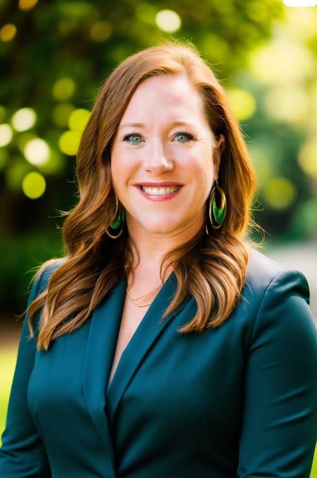 Leanne Ozaine, CDFA, at her desk in Spokane
